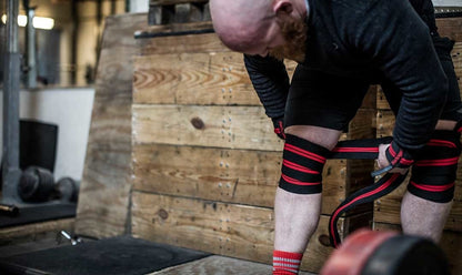 Harbinger Red Line Knee Wraps aanleggen